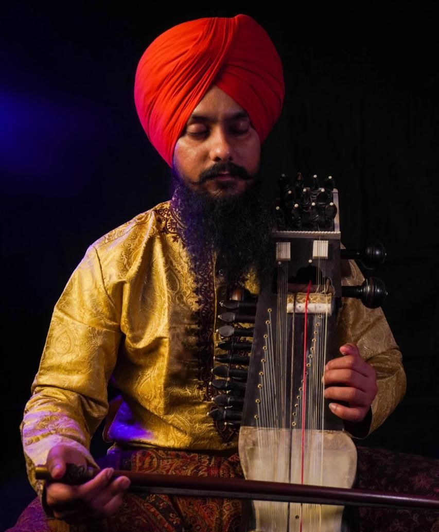 Satwinder Pal Singh playing sarangi